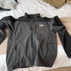 The North Face grey men’s shell jacket size M